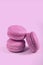 Delicious french dessert. Three gentle soft pink purple cakes  macaron or macaroon