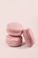 Delicious french dessert. Three gentle soft pink purple cakes  macaron or macaroon