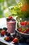 Delicious fresh berries smoothie served outside on a sunny day. Healthy fitness snack.