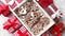 Delicious fresh Christmas decorated gingerbread cookies placed in wooden crate