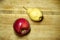 Delicious fresh fruits on the background of a wicker bottom of the basket.