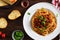 Delicious fresh homemade spaghetti bolognaise with salad and garlic bread