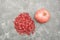 Delicious fresh juicy pomegranate in cuts on a gray background