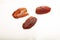 Delicious fresh organic dates on white background