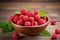 Delicious Fresh Raspberries in a Rustic Setting: A Visual Feast on Wooden Table.