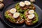 Delicious fresh sandwiches with toast, canned salmon, salad and quail eggs