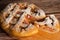 Delicious fresh shiny Apple pie with cut piece on wooden background. Close up.