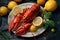 Delicious freshly boiled lobster on a plate with a lemon