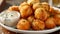 Delicious fried cheese balls with dipping sauce