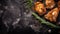 Delicious Fried Chicken With Herbs On A Black Background