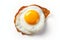 Delicious fried egg isolated on a clean white background, captured from a top down perspective