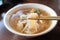 Delicious fried narrow-barred Spanish mackerel fish fillet with rice and noodles in thick soup in Taiwan