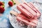 Delicious frozen homemade strawberry popsicles