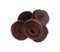 Delicious fruit leather rolls on white background, top view