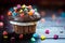Delicious and funny Chocolate Muffin with candies and bokeh background