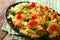 Delicious fusilli pasta with chopped pork, broccoli, tomatoes an