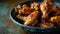 Delicious glazed chicken wings served in a bowl