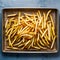 Delicious golden fries arranged on a kraft baking sheet