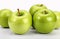 Delicious green apples on white background