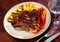 Delicious grilled beef steak with potatoes and vegetables