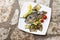 Delicious Grilled bream or dorade fish on wooden background