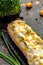 Delicious grilled hotdog in a restaurant, Homemade sausage wrapped hot dogs with cheese and corn. vertical image. top view. place