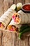Delicious grilled mexican vegan burrito with rice, beans, corn,