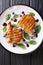 Delicious grilled pork steak with delicate blueberry sauce and s