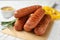 Delicious grilled sausages on white wooden , closeup. Barbecue food