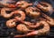 Delicious grilled shrimp meal on grill with a flame