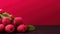 Delicious Group of Fresh Raspberry Fruit On Pink Background with Copy Space Selective Focus