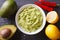 Delicious guacamole sauce close-up on the table. Horizontal top