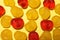 Delicious gummy cherry candies on yellow background