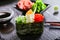 Delicious gunkan with cucumber and masago caviar. Japanese cuisine restaurant menu item. Traditional eastern dish, national cookin