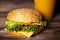 Delicious hamburger on a wooden table