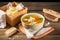 Delicious and healthy chicken noodle soup on a rustic table