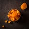 Delicious and healthy dried apricots. Freshly dried. On a dark background