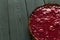 Delicious Healthy Raw Raspberry Tart from Almond Meal and Raspberries on Dark Wooden Background, Free Space for Text