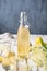 Delicious healthy refreshing beverage, sweet elderflower syrup or cordial in a glass bottle