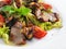 Delicious healthy warm salad with beef and vegetables