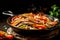 Delicious home cooked beef steak fajitas in iron cast skillet with colorful sweet peppers and onions