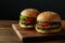 Delicious homemade burgers on wooden board