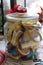 Delicious homemade colourful christmas cookies in a handmade decorated jar