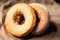 delicious homemade donuts on the table. tasty donuts on a wooden background, sweet food. Generative AI