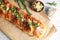 Delicious homemade garlic bread on table