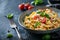 Delicious homemade Italian pasta with fresh tomatoes and basil