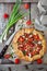 Delicious homemade rustic open pie & x28;galette& x29; with tomato, cheese