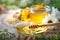 Delicious honey and fresh pollen of flowers on a wooden table. Selective focus.