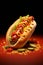 Delicious hot dog nestled in a soft bun, hot dog is topped with fresh salad leaf, tangy ketchup, and zesty mustard. Vibrant red