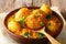 Delicious Indian Potato Dum aloo in curry sauce close-up. horizontal